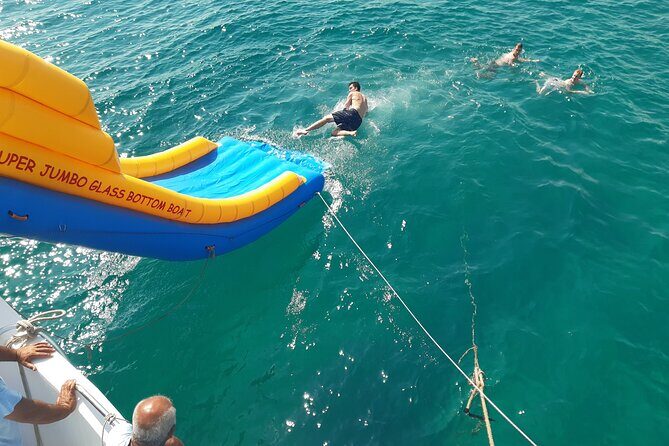 2.5 hour Glass Bottom Boat Trip, Snorkeling, Sliding and Fun - The Sum Up