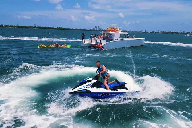 3 Hour Party Boat Jet ski Banana Tube and open bar in Miami - Miami Water Adventure: 3-Hour Party Boat with Jet Skis, Banana Boat, and Open Bar