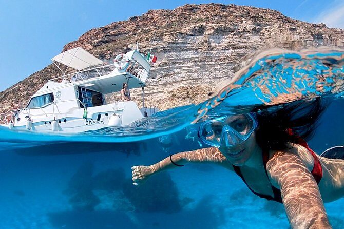 7 hours Boat trip to Lampedusa lunch, SUP and Snorkeling - Key Points
