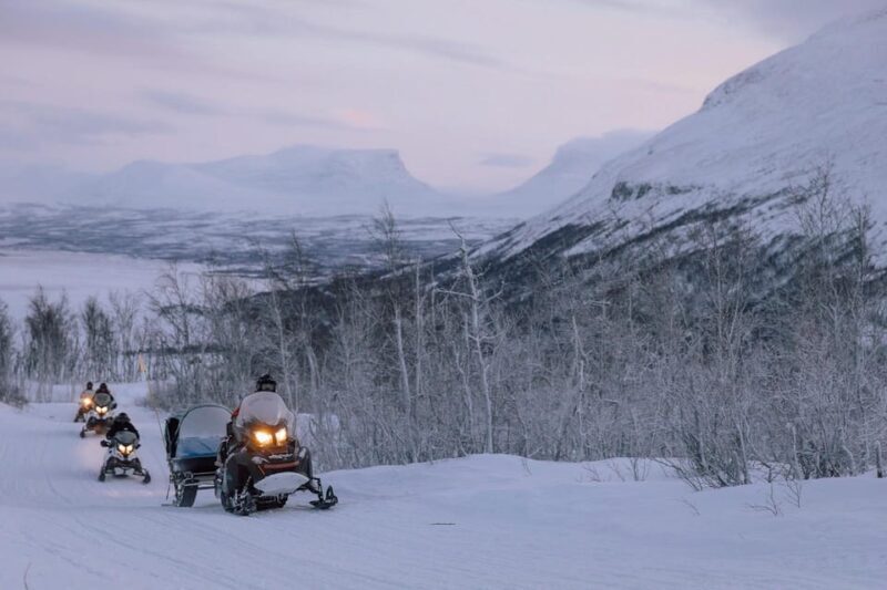 Abisko/Björkliden: Panorama Snowmobile Tour with Snacks - Key Points