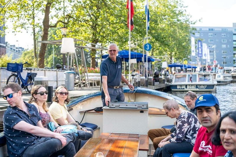 Amsterdam: 75 minute Open Boat Canal Cruise with Live Guide - Practical Tips for Your Cruise