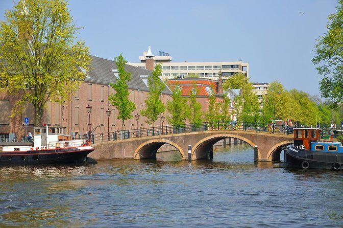 Amsterdam Classic Saloon Boat Cruise, Drinks and Cheese Option - An Authentic Amsterdam Canal Experience