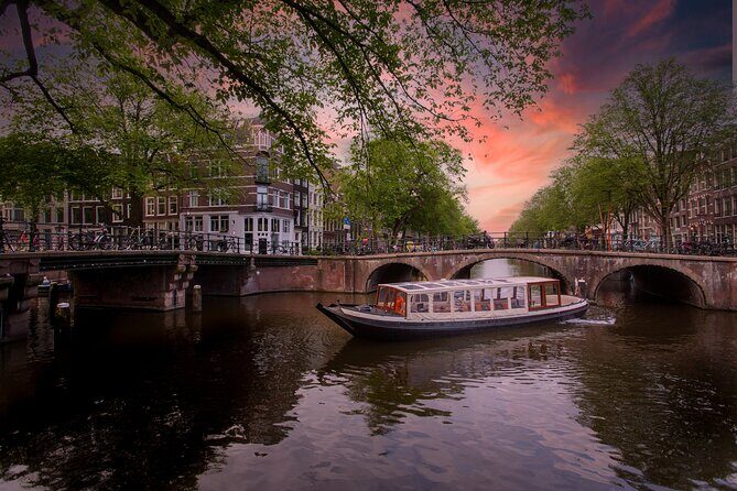 Amsterdam Evening Canal Cruise with Live Guide and Onboard Bar - The Highlights and Landmarks