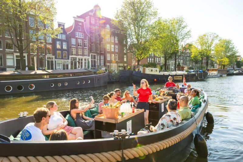 Amsterdam: Guided Open Boat Cruise Unlimited Drinks Option - Discover Amsterdam from the Water: A Guided Open Boat Cruise with Unlimited Drinks