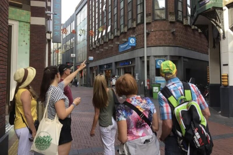 Amsterdam: History, Culture & Hidden Gems Walking Tour - Canal-side Elegance and the Dutch East India Company
