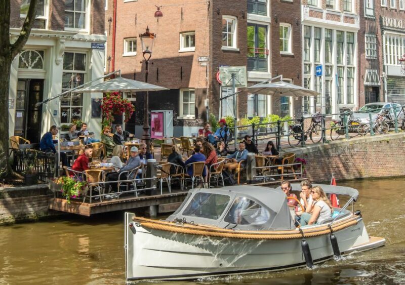 Amsterdam: Jordaan District Tour with a German guide - Practical Details and Tips