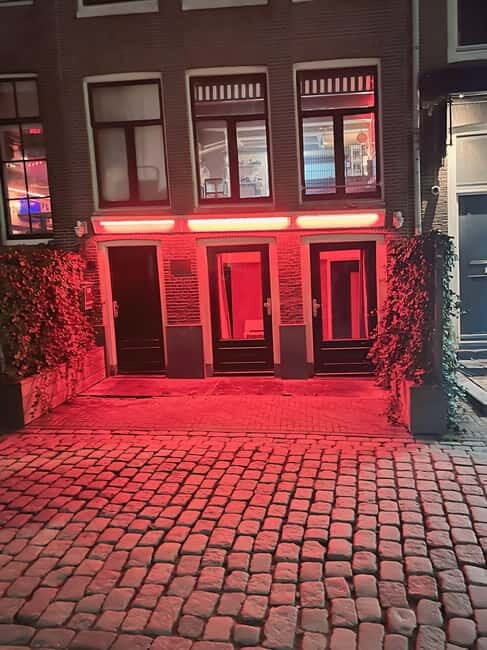 Amsterdam: Red Light District Tour in German/English for groups of 4 or more - Detailed Breakdown of the Tour