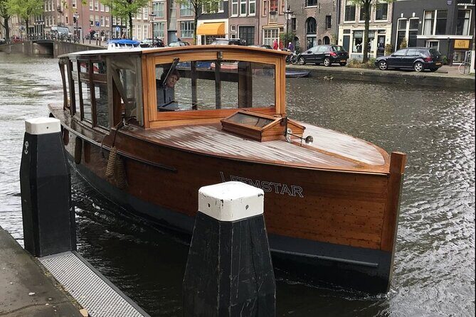 Amsterdam small-group canal cruise in 1920s saloon boat - The Sum Up