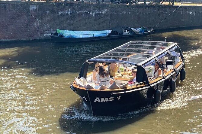 Amsterdam Small-Group Canal Cruise Including Snacks and Drinks - Who Will Love This Tour?