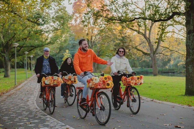 Amsterdam: Top Highlights Guided Bike Tour EN/DE/ES/FR/IT/CN - The Experience: What You Can Expect