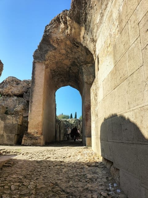 Ancient Rome in Seville: Exclusive Italica Guided Tour - The Itálica Amphitheater: A Roman Marvel