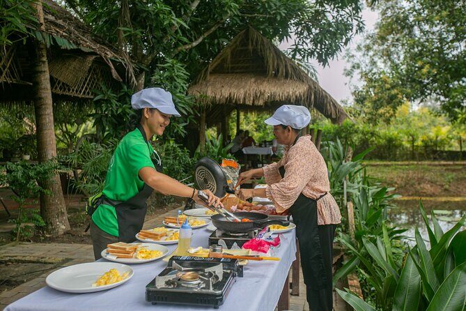 Angkor Sunrise Bike Tour with Breakfast and Lunch Included - Key Points