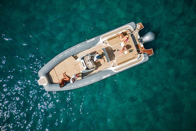 Aperitif on a boat at sunset in the Gulf of Naples - The Swim and Scenic Stops That Make it Special
