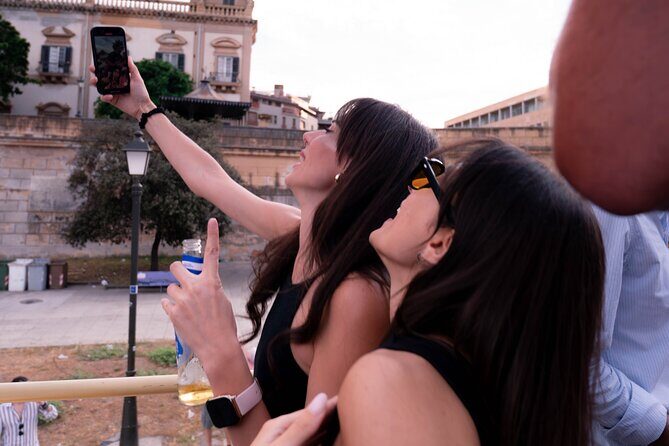 Aperitif on a bus tour around the city of Palermo - The Sum Up