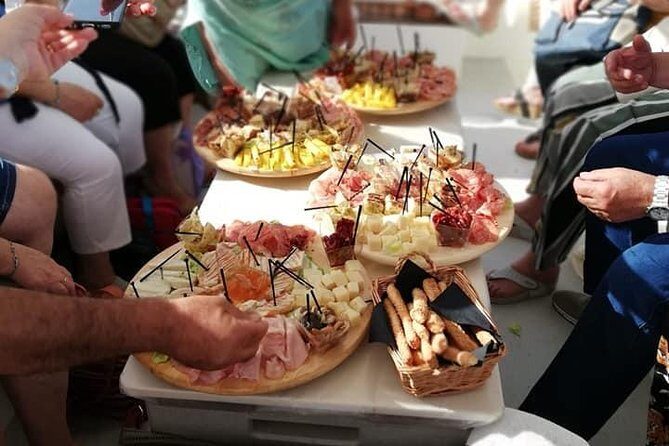 Aperitif on the boat at Sunset island and sea caves - In-Depth Review of the Sunset Island and Sea Caves Boat Tour