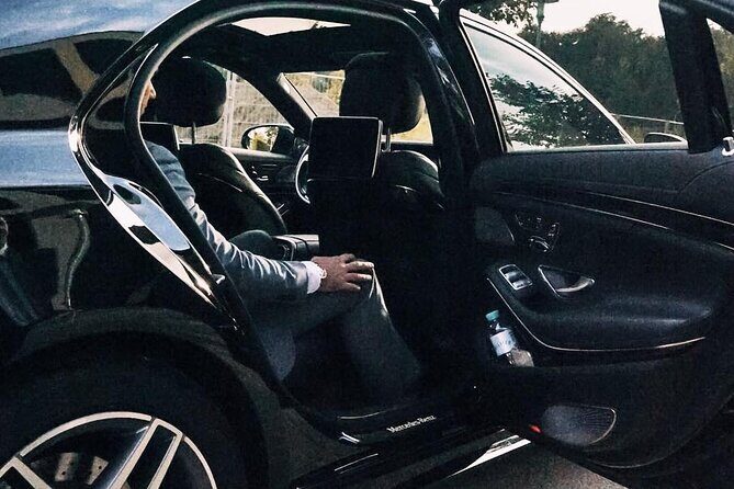 Arrival Transfer: Madrid Airport MAD to Madrid in Business Car - Key Points