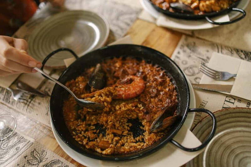 Barcelona: Food Walking Tour with Tapas and Wine - Guides and Group Experience