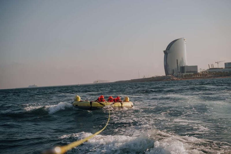 Barcelona: Inflatable Water Tube Ride at Port Olímpic - Key Points