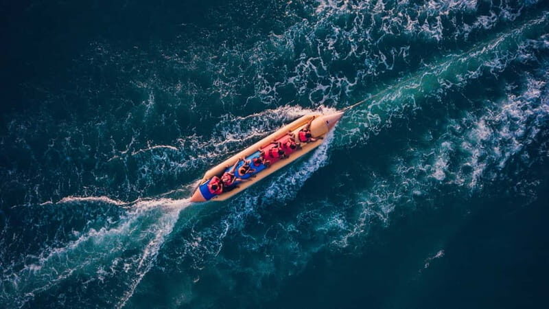 Barcelona: Inflatable Water Tube Ride at Port Olímpic - Practical tips for booking and enjoying this tour