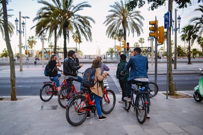 Barcelona Night Bike Tour with Local Tapas and Cava Stop - Key Points