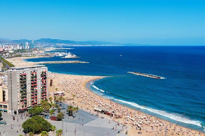 Barcelona Sunset Cruise with Light Snacks and Open Bar - Experience the Magic of a Barcelona Sunset Cruise