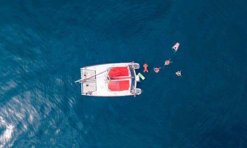 Barcelona: Sunset or Day Catamaran Cruise with Tapa & Drink - Swimming, Sunbathing, and Other Highlights