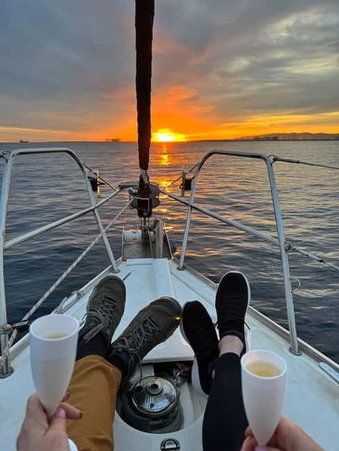 Barcelona: Sunset Sailboat Cruise with Open Bar and Snacks - Key Points