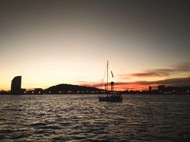 Barcelona: Sunset Sailing Tour with Tapas and Open Bar - Key Points