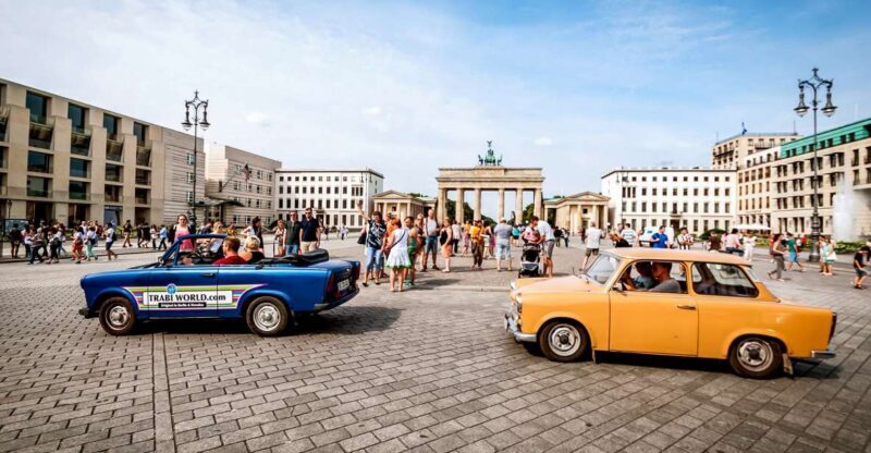 Berlin: 75-minute Trabi Safari - Experience Berlin like never before with a 75-minute Trabi Safari in the iconic Trabant. Starting at TrabiWorld near Zimmerstraße, this tour offers a playful way to see Berlin’s most famous landmarks, including Brandenburg Gate, the Berlin Wall, and Checkpoint Charlie. For a cost of about $90 per person, you get to take the wheel of a vintage East German car, enjoy live commentary, and receive your own drivers license as a keepsake.