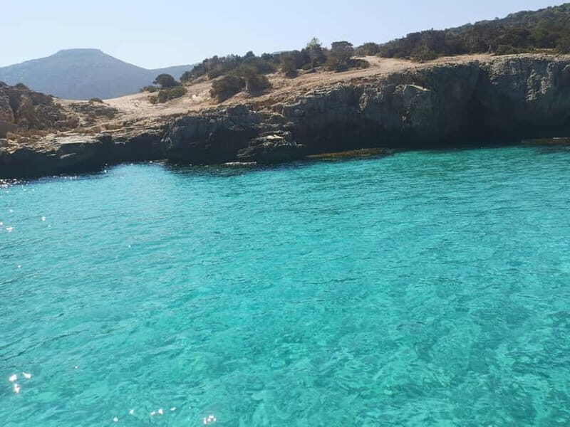 Blue Lagoon Latchi, coach transfer+boat trip, Half day trip - The Sum Up