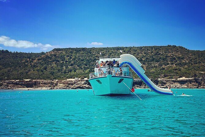 Blue Lagoon trip with slide, music & transfer from Paphos - An Authentic Day at the Blue Lagoon: Paphos to Paradise on a Boat