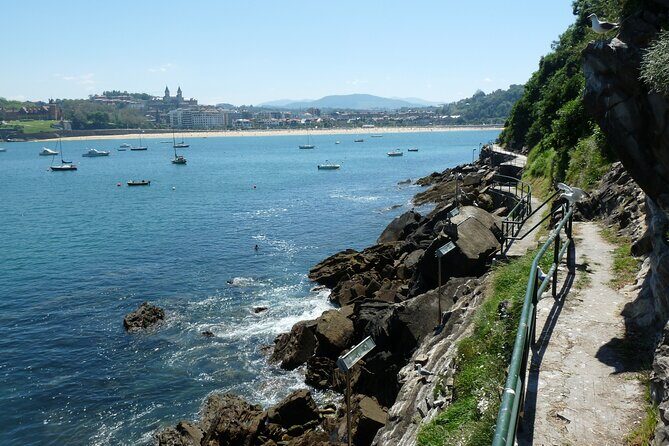 Boat by the Bay and Santa Clara Island in Donostia San Sebastian - The Sum Up