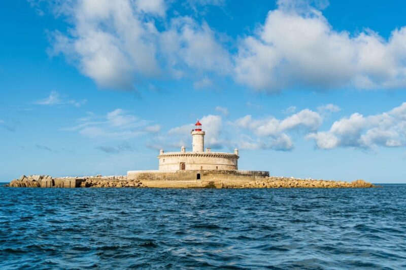 Boat tour: charming Cascais Coast to Lisbon lighthouse - The Sum Up