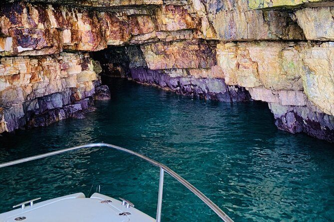 Boat tour of the Polignano a Mare caves with aperitif - Experience the Stunning Sea Caves of Polignano a Mare on a Relaxing Boat Tour with Aperitif