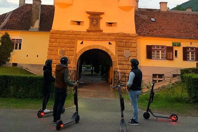 Brasov Old Town Guided Tour With Electric Scooters - Key Points