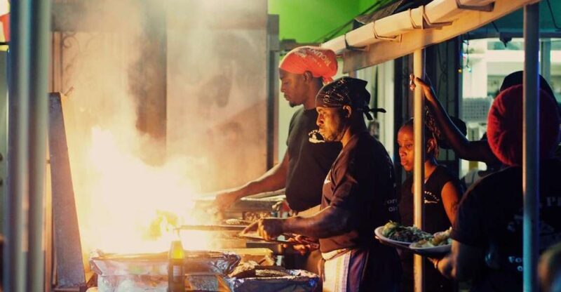 Bridgetown: Oistins reservation with drink & return transfer - Key Points