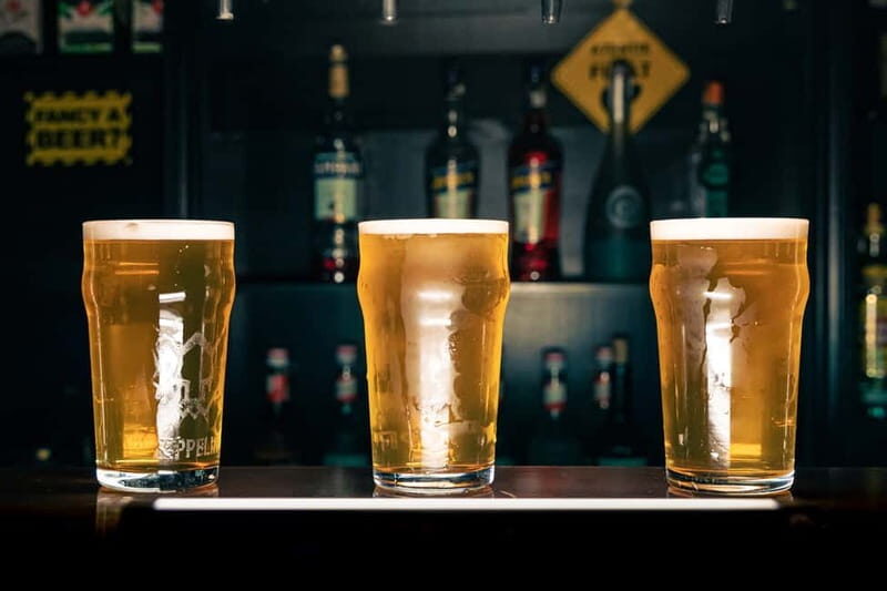 Bucharest: Craft Beer Tour with Traditional Meal - Walking Through Bucharest’s Architectural Gems