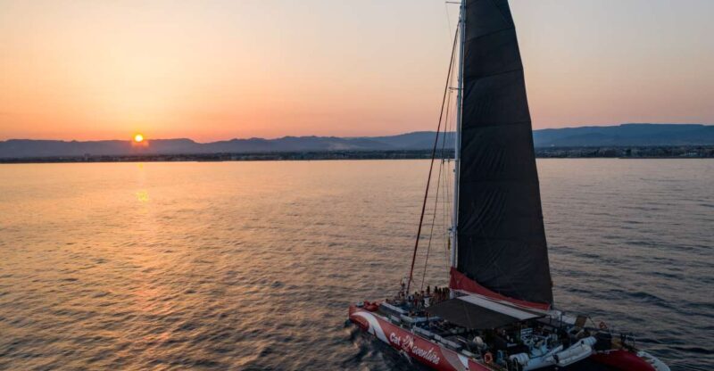 Cambrils: Sunset Catamaran Cruise & Drinks w/ Sunbed - Key Points
