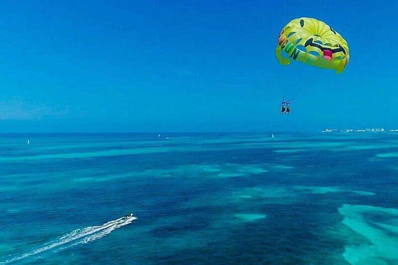 Cancun Combo Tour: 4-Reef Stop Snorkeling and Parasail Ride - Key Points