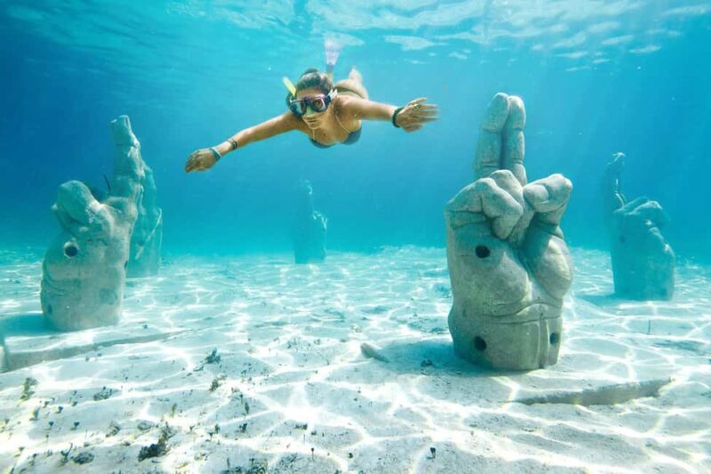 Cancun: Isla Mujeres Royal Garrafon with Transport & Lunch - The Sum Up