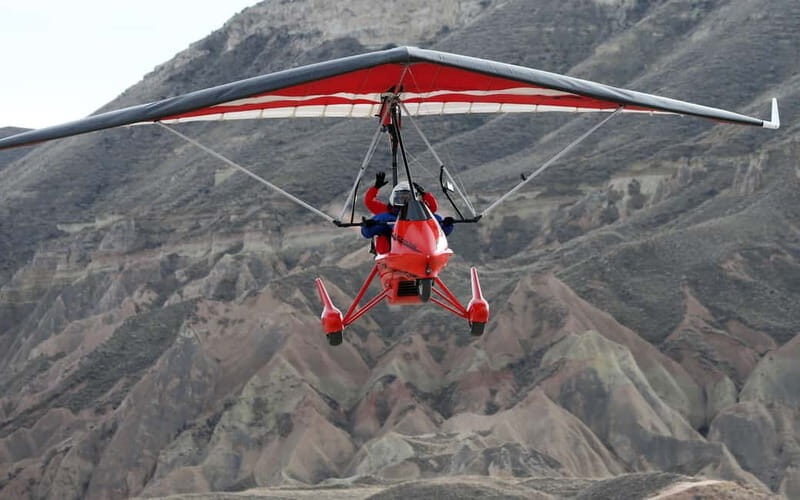 Cappadocia: Motor Paragliding Over Göreme w/Hotel Tranfers - Key Points