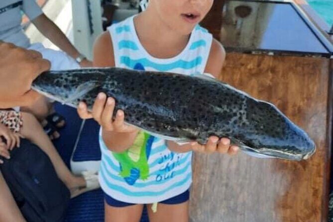 Captain Manolis Fishing with barbecue on the boat - What You Can Expect from the Tour