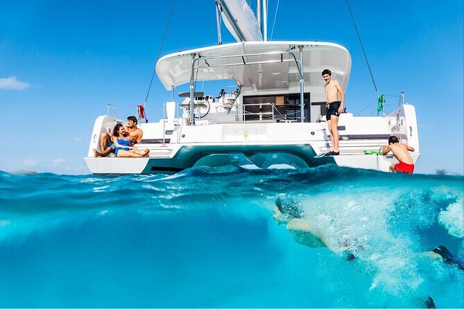 Catamaran Day & Sunset Cruises with meals Drinks and transportation - Key Points