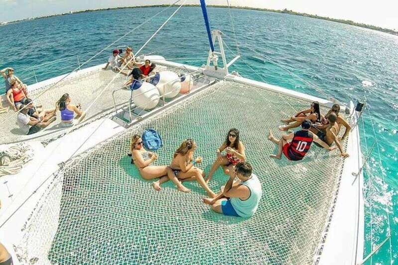 Catamaran party Isla Mujeres with drinks & lunch - The Highlights and Authentic Experiences