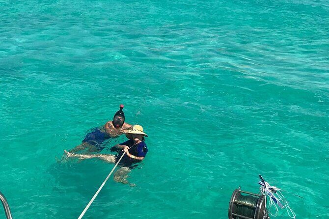 Catamaran Snorkeling Tour from Cancun with Buffet Lunch - Key Points