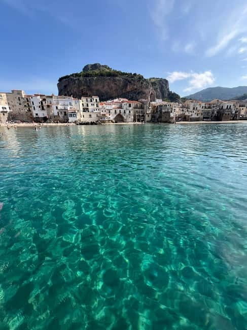 Catamaran tour along the Cefalù coast with aperitif and snorkeling - Authenticity and Value