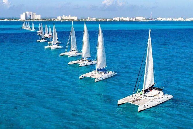 Catamaran tour to Isla Mujeres with snorkeling, open bar - Exploring the Tour in Detail