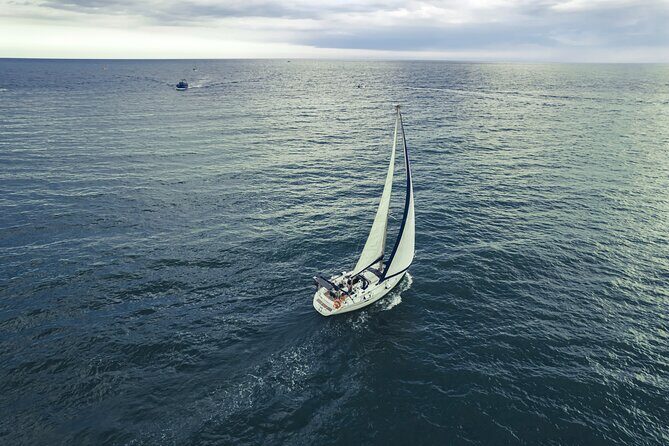 Catania: Sail Cyclops Coast by Boat and Enjoy a Sicilian Aperitif - The Journey to Aci Castello