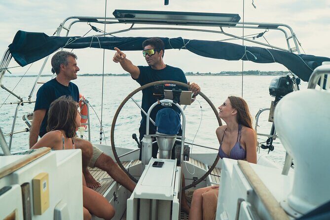 Catania: Sail Cyclops Coast by Boat and Enjoy a Sicilian Aperitif - The Black Coastline and Optional Water Activities