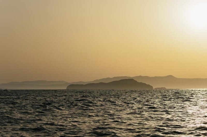 Chania: Sunset Boat Cruise with Guide - Key Points